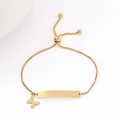 Detail of adjustable gold stainless steel bracelet with butterfly charm and bar - Butterfly (Gold) / Gold