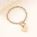 Elegant rose gold stainless steel heart pendant bracelet with a stylish OT toggle clasp - Rose Gold 20mm Fan-Hole Heart Toggle Bracelet