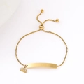 Adjustable gold stainless steel bracelet with a curved plate and small crown charm - Crown (Gold)