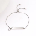 Detailed macro view of adjustable box chain bracelet with silver metal ID tag and star charm - Open Star (Silver)