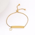 Detailed shot of golden stainless steel bar bracelet with hollow star charm and slide clasp - Open Star (Gold)