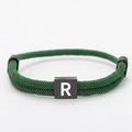 Green woven Milan rope bracelet with black square bead featuring white letter R detail - Green Rope Letter R