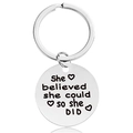 Macro shot of silver stainless steel keychain engraved with She believed she could so she DID - Silver (Y00001)