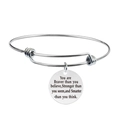Close-up of expandable stainless steel bangle with engraved inspirational round pendant - Inspirational Phrase (Y00005)