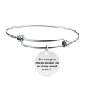 Detail of silver adjustable bracelet with an engraved inspirational quote charm - You were given this life because you are strong enough (Y00006)