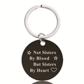Macro detail of black metal keychain with engraved Not Sisters By Heart quote - Sisterhood Quote Style (Y00002)