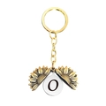 Vue détaillée du porte-clés tournesol doré avec pendentif ouvrant à la lettre O - Style Lettre O (T00039) / Or