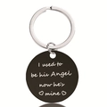 Detail of black round stainless steel keychain engraved with memorial angel quote and heart - Angel Memorial Style (Y00016)