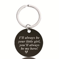 Macro shot of black stainless steel keychain with engraved hero quote and heart symbol - Little Girl Feelings Style (Y00019)