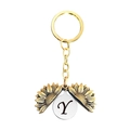 Détail du porte-clés médaillon tournesol montrant la lettre Y gravée à l'intérieur - Style Lettre Y (T00049) / Or