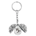Macro view of silver sunflower locket keychain with Capricornus engraving detail - Silver Capricorn (T00022)