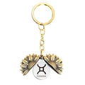 Macro view of Gemini zodiac sunflower keychain with hidden silver metal engraved plate - Gold Gemini (T00015)