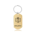 Macro shot of gold medical alert keychain with Star of Life and Epilepsy engraving - Epilepsy (W00063) / Gold