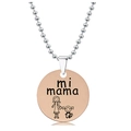 Detail of rose gold round pendant necklace with mi mama text and mother daughter sketch - Mother Daughter Cartoon Style (Rose Gold)