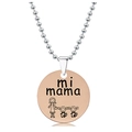 Macro detail of rose gold pendant with mi mama text and cartoon children engraving - Mother Two Kids Sketch Style (Rose Gold)
