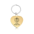 Detail of golden heart medical alert tag with Type 1 Diabetes text and star of life - Type 1 Diabetes (X00019) / Gold