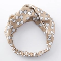 Elegante diadema anudada beige con estampados de lazos blancos y banda elástica - Albaricoque