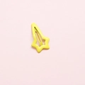 Mini yellow star-shaped metal hair clip with a sleek drip oil finish on pink background - Yellow