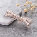 Fermaglio per capelli a fiocco dorato con perle bianche e strass brillanti per donna - Papillon