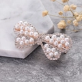 Elegante fermaglio per capelli a fiocco con perle bianche e strass scintillanti in argento - Farfalla di Perle