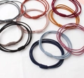 Set de gomas elásticas para el pelo multicolores de tres hilos para mujer - Multicolor