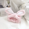 Plush pink 3D bunny ear headband made of soft coral fleece for skincare and makeup - Pink