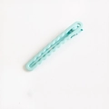 Mint green wavy matte metal hair clip for women featuring a minimalist sleek bobby pin design - Mint Green