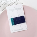Set of 10 navy blue rainbow hair clips with light blue dot detail on white card - Navy Blue