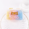 Close-up of colorful candy-colored hair elastics organized in a transparent cat-themed box - Jelly Color