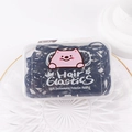 Close-up of black hair elastics for kids in a box with cute pink cat illustrations - All Black