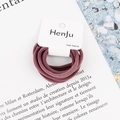 Macro shot of 6-piece elastic hair bands in dusty pink on a stylish branded card - Dusty Pink