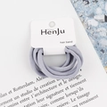 Set of grey high-elastic knit hair bands on a stylish fashion magazine background - Light Blue