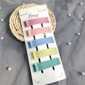 Pastel matte hair clip set featuring pink, blue, yellow, and green tones on display card - Macaron Matte Curved