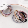 Detailed view of elastic fabric hair bands in pastel colors with love heart text print - Letter Style