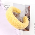 Detail of bright yellow plush lamb wool headband with thick soft faux fur texture - Yellow