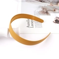 Detailed view of mustard yellow matte headband featuring non-slip teeth for secure styling - Autumn Yellow