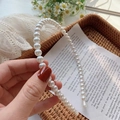 Detailed macro view of white faux pearls arranged on a narrow elegant headband - 1# Round Beads White