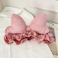 Detail of soft pink faux suede headband with a 3D bow design for skincare use - Lotus root pink