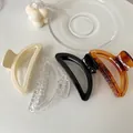 Elegant large pearl claw clips in four colors on a minimalist white background - Large / Mixed Colors