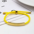 Adjustable woven rope bracelet in bright yellow with a polished gold metal curved bar - Yellow Rope / Gold Metal