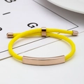 Minimalist yellow braided rope bracelet with a polished rose gold slider charm and metal ends - Yellow Rope / Rose Gold Metal
