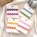 Matte Macaron-Blumen-Haarclips-Set im koreanischen Stil auf elegantem weißem Stoff - Gemischte Farben