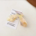 Detail of a gradient yellow and purple acetate hair claw clip on a minimalist background - Purple-Yellow Series
