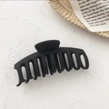 Detail showing the matte black finish and sturdy claw design of the large hair clip - Matte Black Keel Clip