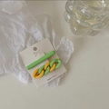 Detail view of 2-piece candy-colored chain hair clips on a white display card - Yellow-Green