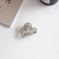 Detailed macro view of heart-shaped marble acetate hair claw clip with metal spring - Heart Shape (Gray Marble Pattern)