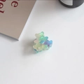 Detail of bear-shaped acetate hair claw clip with colorful jelly gradient finish - Bear Shape (Holographic Gradient)
