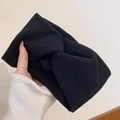 Detail of soft black twisted knit headband showing the texture and knot design - Solid Twist Style / Black