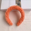 Diadema de lana de cordero afelpada en rosa albaricoque para mujer textura teddy - Naranja