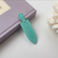 Mint green matte hair clip with seamless design on light purple background - Lake Blue